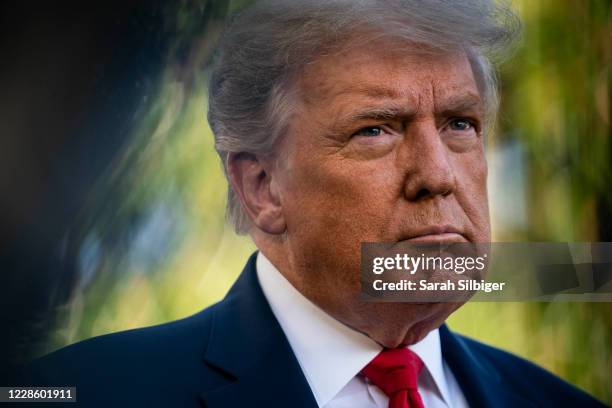 President Donald Trump speaks to members of the press prior to his departure from the White House on September 19, 2020 in Washington, DC. President...