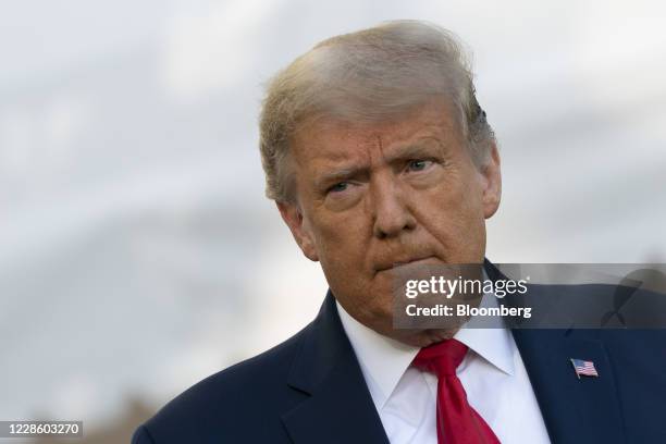 President Donald Trump listens to a question before boarding Marine One on the South Lawn of the White House in Washington, D.C., U.S., on Saturday,...