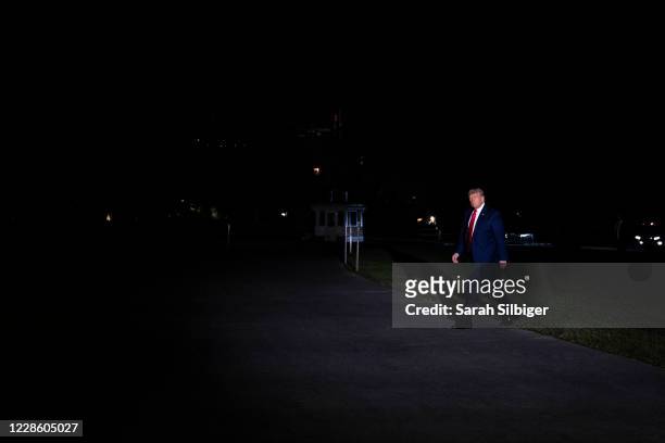 President Donald Trump walks along the South Lawn to the White House on September 19, 2020 in Washington, DC. President Trump is traveled to North...