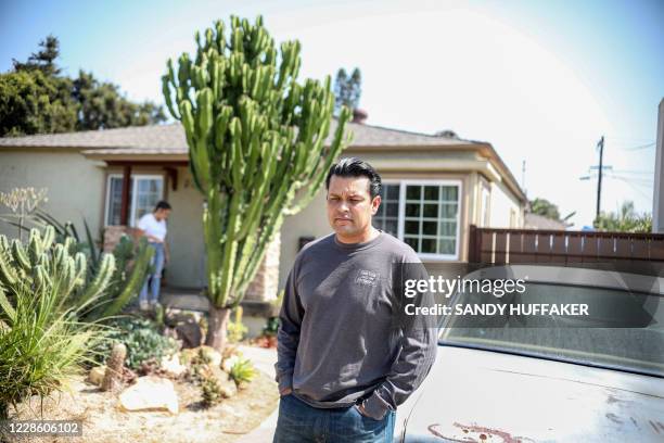 Chula Vista Fire Department BattalioN Chief Darrell Roberts stands outside of his home on September 18, 2020 in Chula Vista, California. - This...