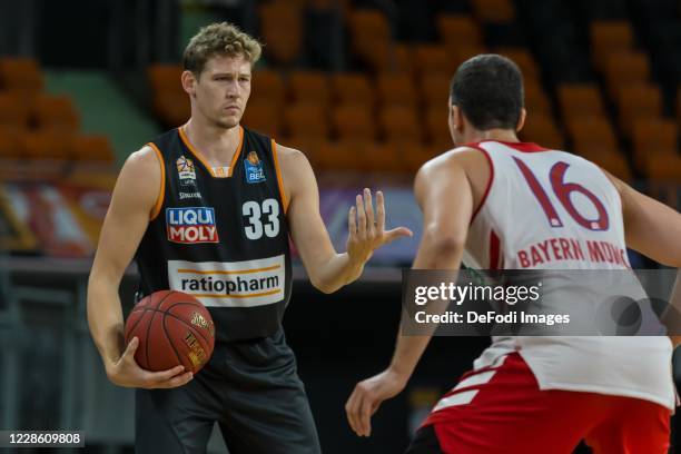 Patrick Heckmann of ratiopharm ulm and Paul Zipser of FC Bayern Muenchen Basketball battle for the ball during the Test Match between Ratiopharm Ulm...