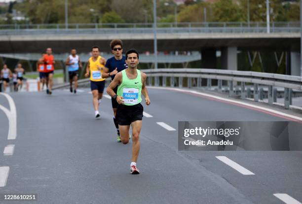 People take part in the 15th Vodafone Istanbul Half Marathon, started from the Yenikapi Square, in Historical Peninsula, Istanbul, Turkey on...