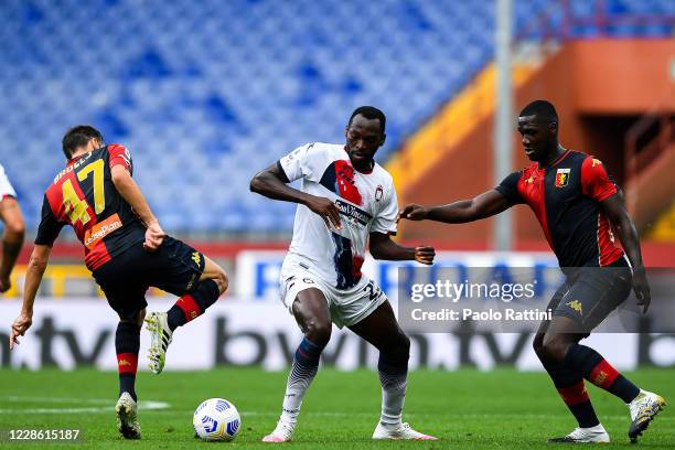 Nwankwo Simy of Crotone controlled by Milan Badelj and Cristian Zapata of Genoa during the Serie A match between Genoa CFC and Fc Crotone at Stadio...