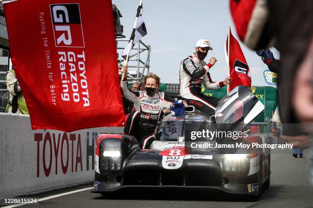 Race winners Brendon Hartley of New Zealand and Sebastien Buemi of Switzerland, with Kazuki Nakajima of Japan driving the Toyota Gazoo Racing Toyota...