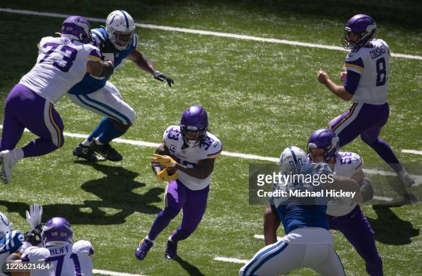 Dalvin Cook of the Minnesota Vikings runs the ball during the first half against the Indianapolis Colts at Lucas Oil Stadium on September 20, 2020 in...