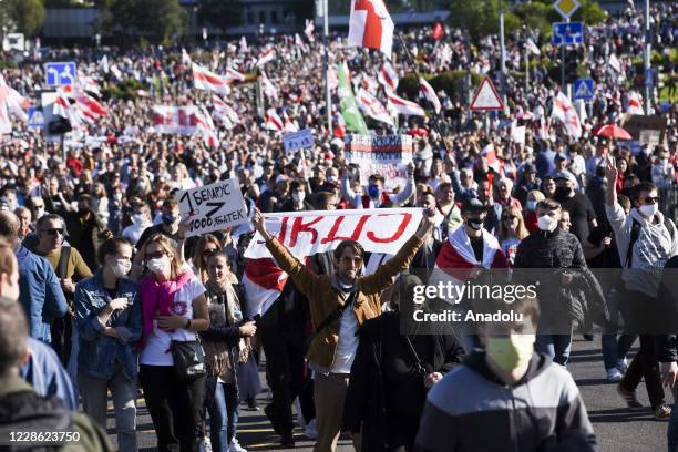 Belarusian opposition supporters take part in a rally against presidential election results, in central Minsk, Belarus on September 20, 2020. Through...