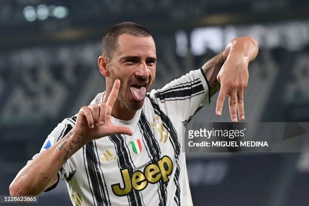 Juventus' Italian defender Leonardo Bonucci celebrates after scoring his team's second goal during the Italian Serie A football match Juventus vs...