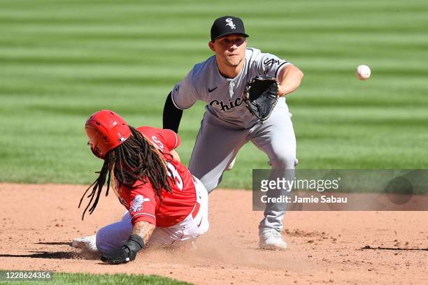 Freddy Galvis of the Cincinnati Reds beats the throw to Yolmer Sánchez of the Chicago White Sox to break up a double play attempt in the fifth inning...