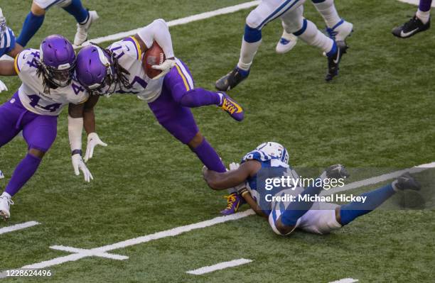 Osborn of the Minnesota Vikings runs the ball and is tackled by T.J. Carrie of the Indianapolis Colts at Lucas Oil Stadium on September 20, 2020 in...