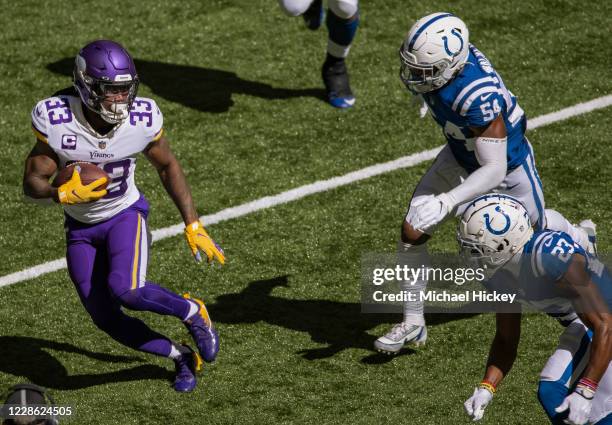 Dalvin Cook of the Minnesota Vikings runs the ball during the second half against the Indianapolis Colts at Lucas Oil Stadium on September 20, 2020...