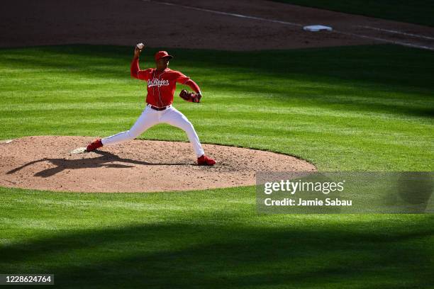 Raisel Iglesias of the Cincinnati Reds pitches in the ninth inning to close out a 7-3 victory over the Chicago White Sox at Great American Ball Park...