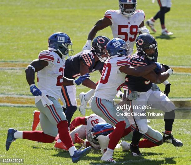 Chicago Bears running back David Montgomery rushes in the fourth quarter against the New York Giants on Sunday, September 20 at Soldier Field in...