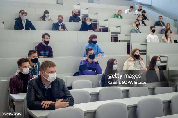 Students wearing face masks as a precaution. High school students from various schools in Tambov at an additional lesson and practical seminar on...