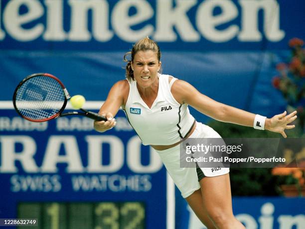 Jennifer Capriati of the United States returns the ball against Martina Hingis of Switzerland in the women's singles final during the Australian Open...