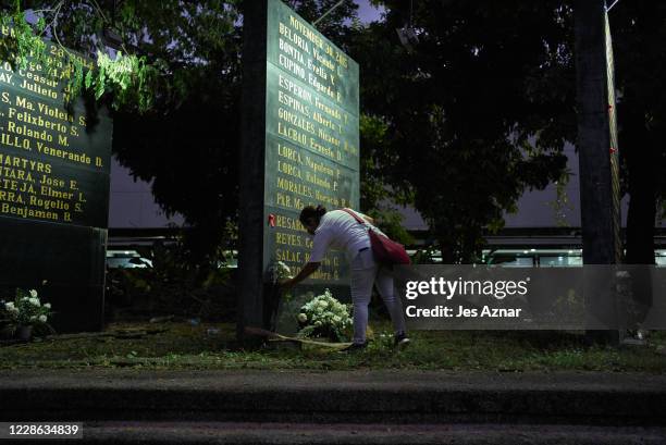 Filipino journalists gathered at the Monument of Heroes to offer prayers and flowers to fallen colleagues on the anniversary of Martial Law in the...