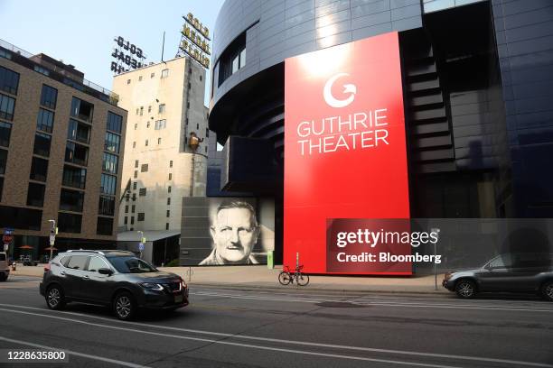 Vehicle passes in front of Guthrie Theater temporarily closed in Minneapolis, Minnesota, U.S., on Saturday, Sept. 19, 2020. In 2020, the pandemic and...