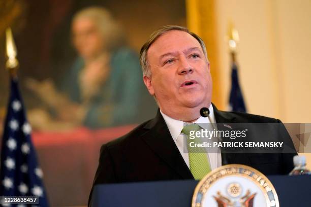 Secretary of State Mike Pompeo speaks during a news conference to announce the Trump administration's restoration of sanctions on Iran, on September...