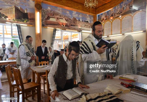 Group of Orthodox Jews praying on the last day of Rosh Hashanah, the Jewish New Year, in the synagogue at the Center for the History and Culture of...