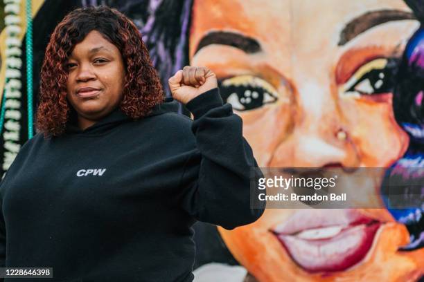 Tamika Palmer, mother of Breonna Taylor, poses for a portrait in front of a mural of her daughter at Jefferson Square park on September 21, 2020 in...
