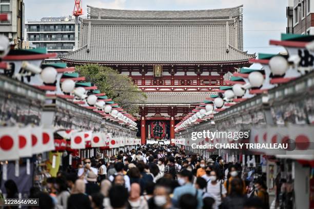 People visit Sensoji temple in Tokyo's Asakusa district on September 22, 2020.