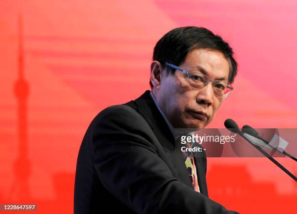 This photo taken on November 18, 2013 shows Ren Zhiqiang, the former chairman of state-owned property developer Huayuan Group, speaking at the China...