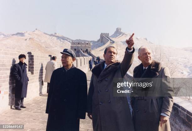 President Richard Nixon and US Secretary of State William Rogers visit the Great Wall of China north of Beijing on February 24, 1972 during an...