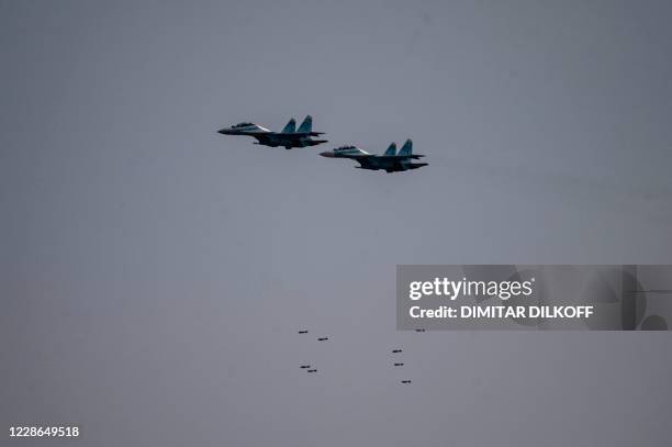 Russian fighter jets drop bombs over the Ashuluk military base in Southern Russia on September 22, 2020 during the "Caucasus-2020" military drills...