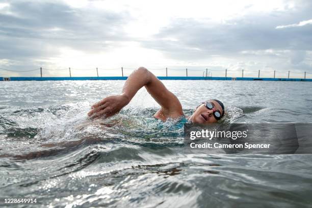 Australian triathlete Emma Jeffcoat swims during a training session at Collaroy ocean pool on May 29, 2020 in Sydney, Australia. Jeffcoat usually...