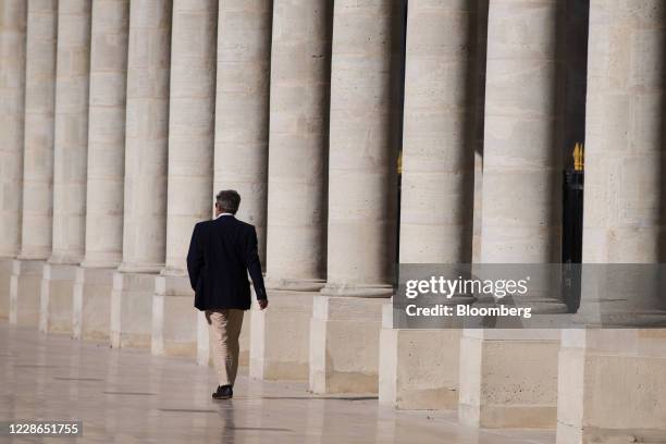 Pedestrian passes columns in the courtyard of the Palais Royal in Paris, France, on Tuesday, Sept. 22, 2020. Earlier this month, Francois Villeroy de...
