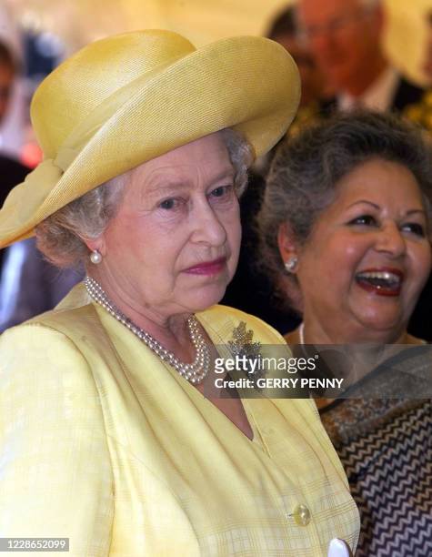 Queen Elizabeth II in pensive mood, with Baroness Flathers , before laying the foundation stone of the Memorial Gates on Constitution Hill, 01 August...