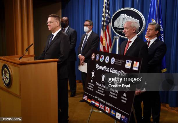 Drug Enforcement Agency acting Administrator Timothy Shea speaks as Chief Postal Inspector Gary Barksdale, Immigration and Customs Enforcement acting...