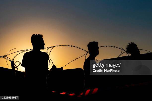 The Covid-19 quarantine area with fences made of barbed wire for the Coronavirus positive cases in the new refugee camp in Kara Tepe - Mavrovouni a...