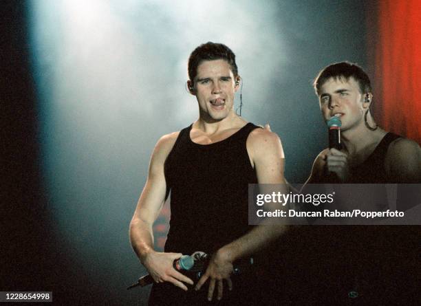 Jason Orange and Gary Barlow of Take That performing during "The Party Tour" at Hylands Park in Chelmsford, England on August 26, 1993.