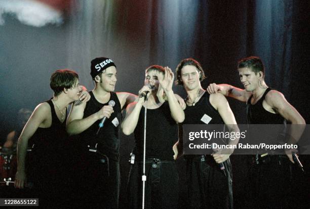 British boy band Take That Mark Owen, Robbie Williams, Gary Barlow, Howard Donald and Jason Orange performing during "The Party Tour" at Hylands Park...