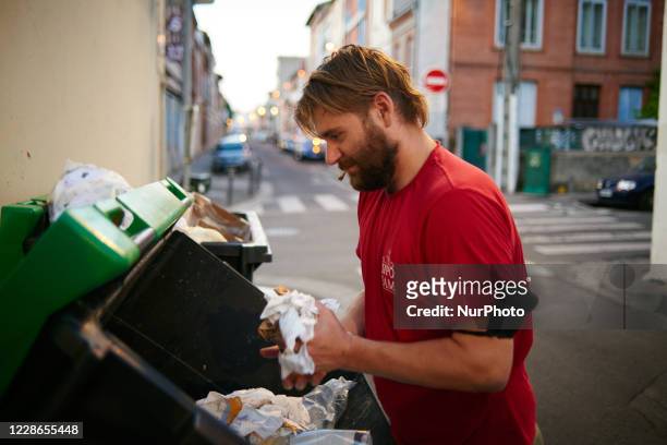 Tarin, a young man, searches for food in trash containers next to supermarkets. When needed he rides his bicycle in search of food. He rummages...