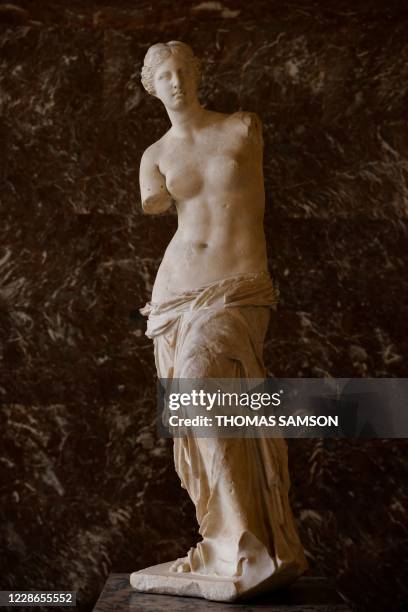 Picture taken on September 22, 2020 shows the ancient Greek sculpture "Venus de Milo" at the Louvre Museum, after its restoration.