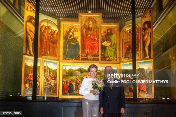 Queen Mathilde of Belgium and King Philippe - Filip of Belgium pose in front of the 'Het Lam Gods' Altarpiece by Hubert and Jan van Eyck at the...