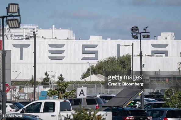 signage-is-displayed-on-the-tesla-inc-assembly-plant-in-fremont