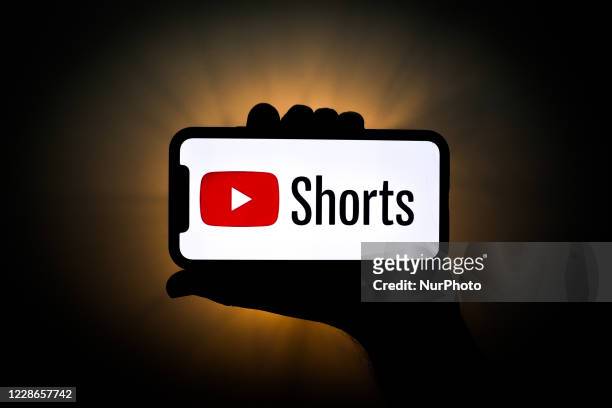 YouTube Shorts logo is seen displayed on a phone screen in this illustration photo taken on September 22, 2020 in Krakow, Poland. YouTube introduced...