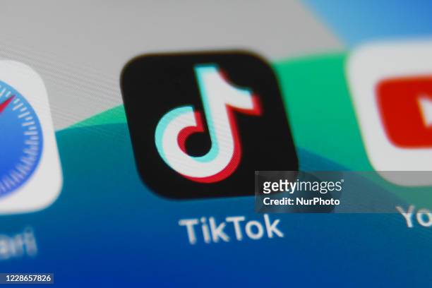 TikTok app icon is seen on a phone screen in this illustration photo taken on September 22, 2020 in Krakow, Poland. YouTube introduced YouTube Shorts...