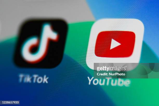 TikTok and YouTube apps icons are seen on a phone screen in this illustration photo taken on September 22, 2020 in Krakow, Poland. YouTube introduced...