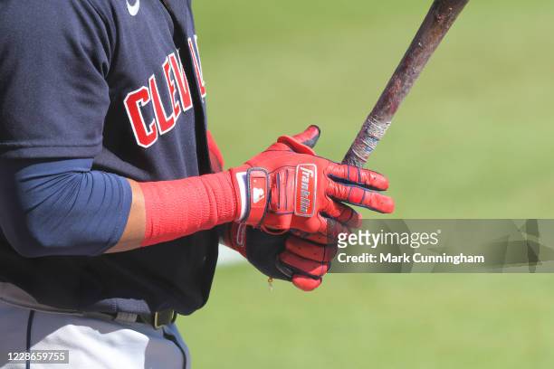 Detailed view of the Franklin batting gloves worn by Carlos Santana of the Cleveland Indians as he bats during the game against the Detroit Tigers at...