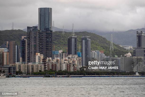 This picture taken on September 19, 2020 from across the water in Hong Kong shows a view of the skyline of Yantian, a district in the neighbouring...