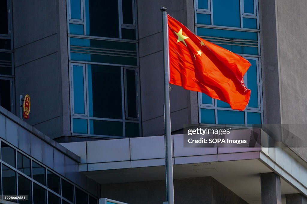 The Chinese flag flies outside the Chinese consulate...