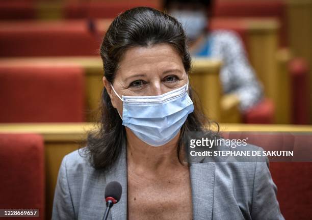 Former French Health minister Agnes Buzyn, wearing a protective face mask, attends her hearing before the French Senate commission of inquiry on the...