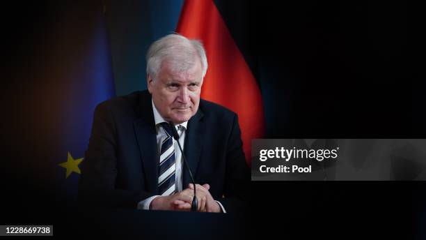 German Minister of Interior, Construction and Homeland Horst Seehofer speaks during a press statement at the Ministry of the Interior on 23...