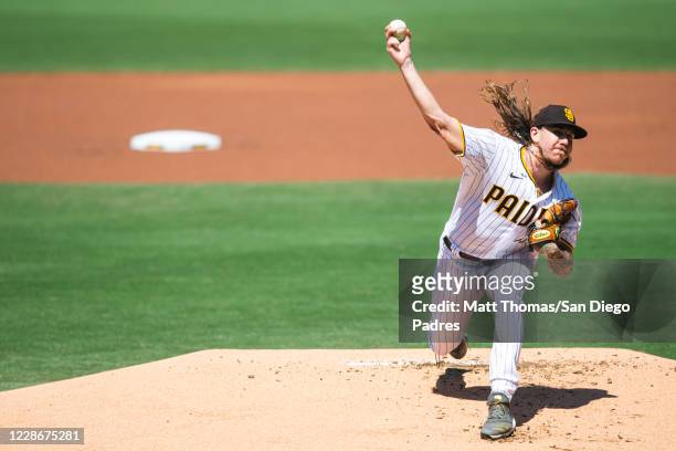 Mike Clevinger of the San Diego Padres delivers a pitch in the top of the first inning against the Los Angeles Angels at PETCO Park on September 23,...