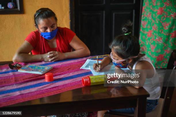 Elisa de Gomez mother studies with her daughter Fernanda Paola, 7 years old on September 23rd in San Luis Pueblo Nuevo Pastores, Sacatepéquez, 48...