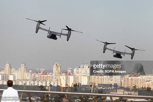 Two CV-22B Osprey tilt-rotor military aircrafts of the U.S. Air Forces fly over Kiev during air drills. Ukrainian and U.S. Special operation military...