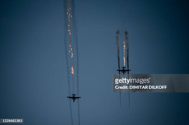 Russian Su-25 fighter jets launch rockets during military exercises at the Prudboy range in Volgograd region, Southern Russia on September 24, 2020...